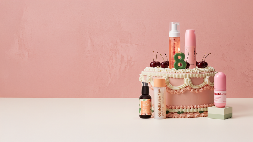 Lady Tabtab 8th birthday cake with a number 8 candle and skincare products
